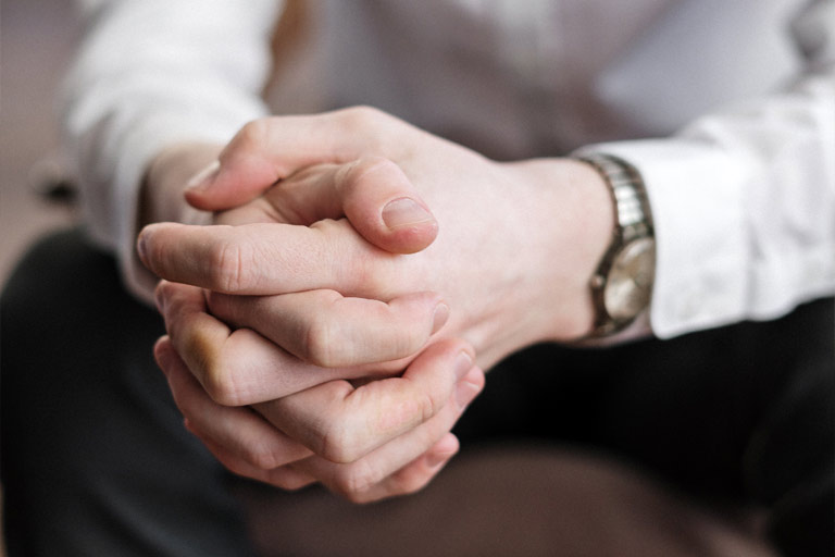 Hands in supportive gesture - symbolising empathy and counselling support